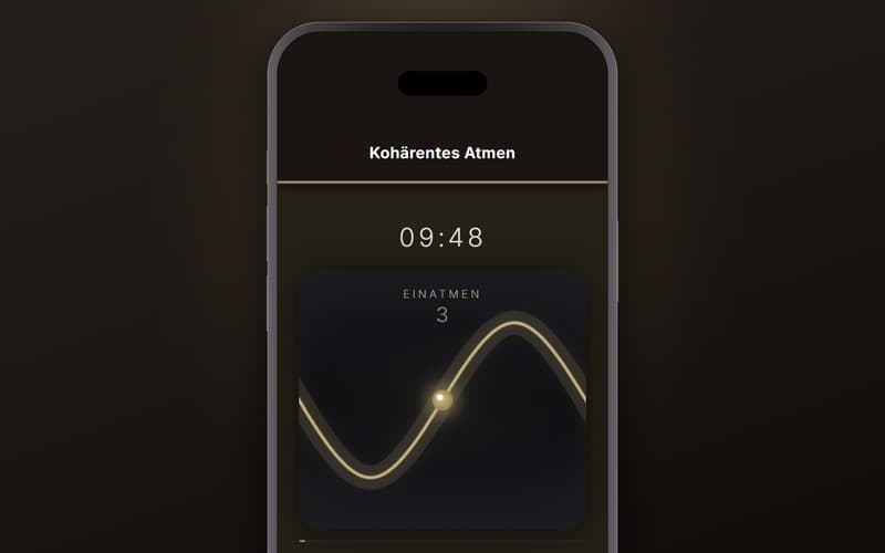 Smartphone mit geöffneter Atemwunder-App, die Atemkurve läuft